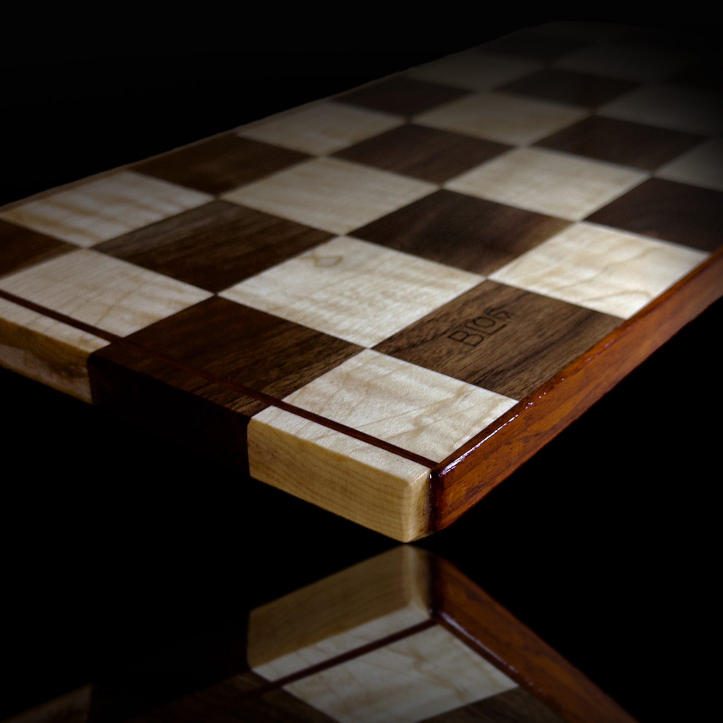 BLOSM | Original | Cutting Board. Checkered (Chess Design)  16in x 9in. Exotic hardwood: Walnut, Maple and Padauk. Limited run design. This one is 1 out of 2 pieces. Luxury, unique, artisan, high-end, handcrafted in USA. - BLOSM | Blossom Woodworking