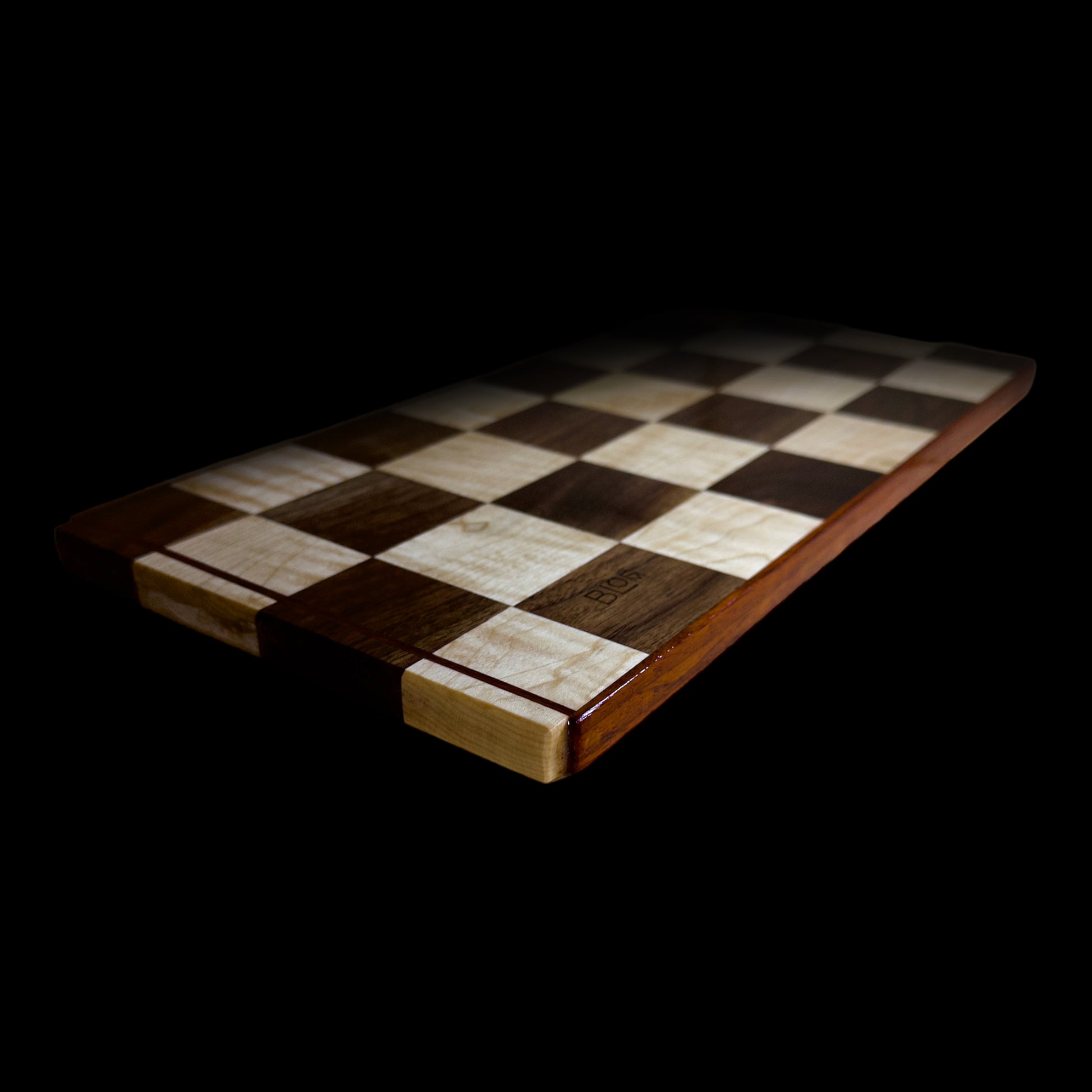 BLOSM | Original | Cutting Board. Checkered (Chess Design)  16in x 9in. Exotic hardwood: Walnut, Maple and Padauk. Limited run design. This one is 1 out of 2 pieces. Luxury, unique, artisan, high-end, handcrafted in USA. - BLOSM | Blossom Woodworking