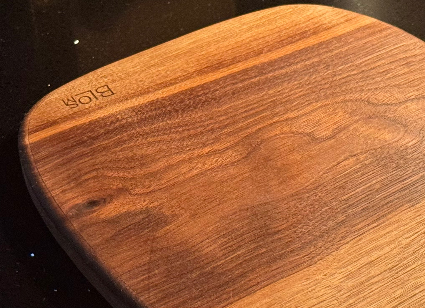 BLOSM | Cutting Boart 12”x 9” with a eggplant / squash handle. Walnut. Designed and Handcrafted in California. - BLOSM | Blossom Woodworking