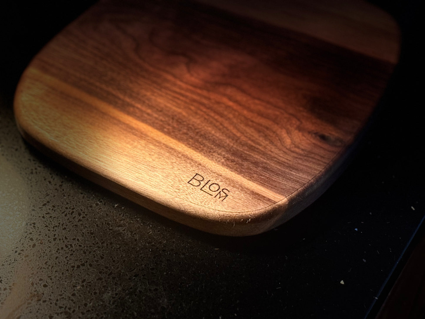 BLOSM | Cutting Boart 12”x 9” with a eggplant / squash handle. Walnut. Designed and Handcrafted in California. - BLOSM | Blossom Woodworking