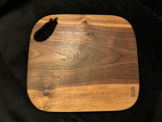 BLOSM | Cutting Board 15"x 13” with a eggplant / squash handle. Walnut. Designed and Handcrafted in California. - BLOSM | Blossom Woodworking