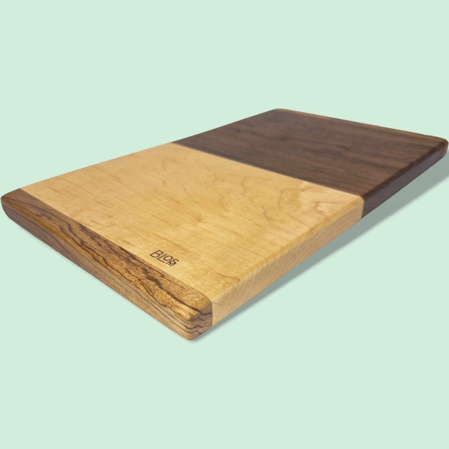 BLOSM | Original | Zebra Line | Cutting Board. Walnut, Maple and Zebra wood. Thick, 1in height x 18in x 10 in. Limited run. Elegant, luxury, unique design, artisan, high-end, handcrafted in USA. - BLOSM | Blossom Woodworking