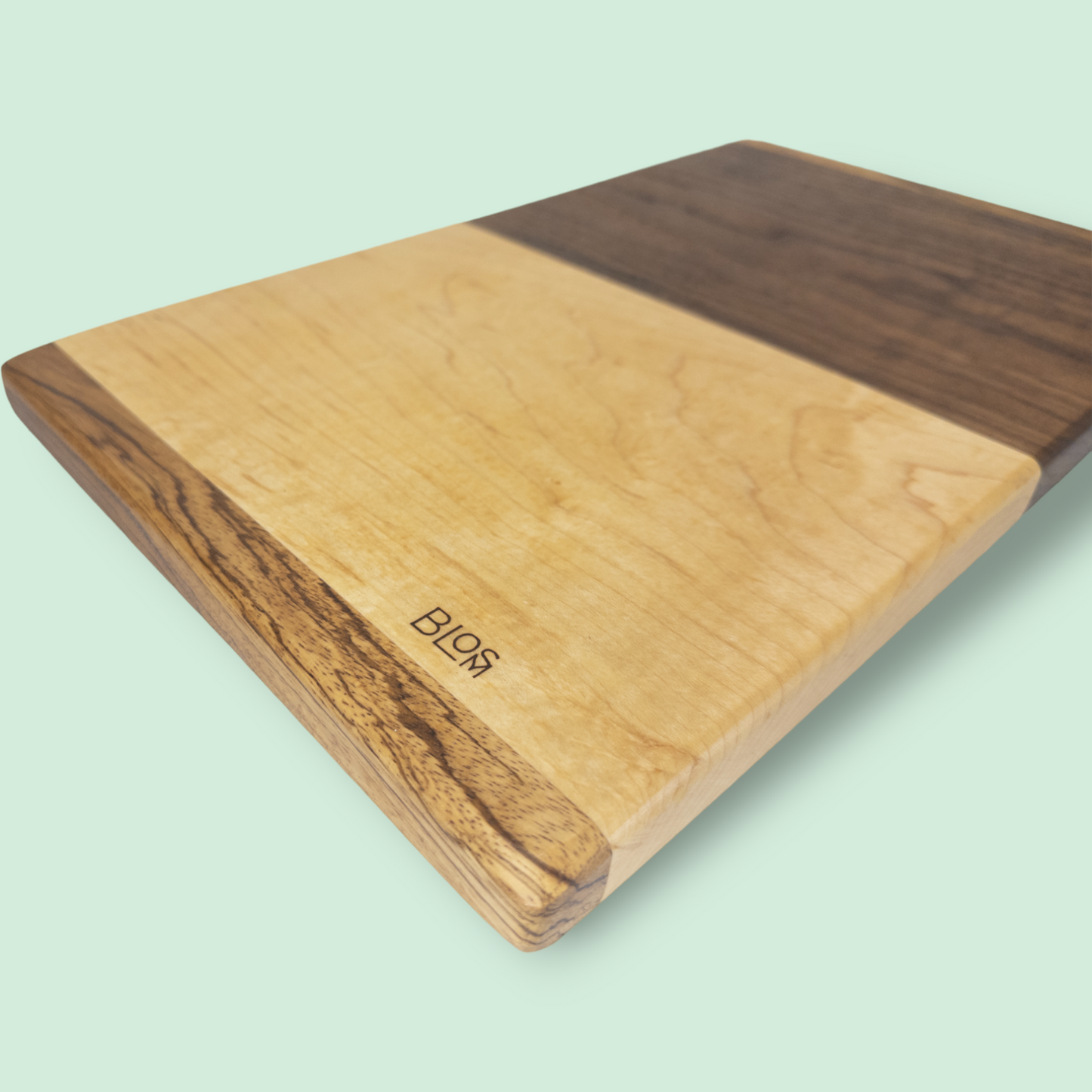 BLOSM | Original | Zebra Line | Cutting Board. Walnut, Maple and Zebra wood. Thick, 1in height x 18in x 10 in. Limited run. Elegant, luxury, unique design, artisan, high-end, handcrafted in USA. - BLOSM | Blossom Woodworking